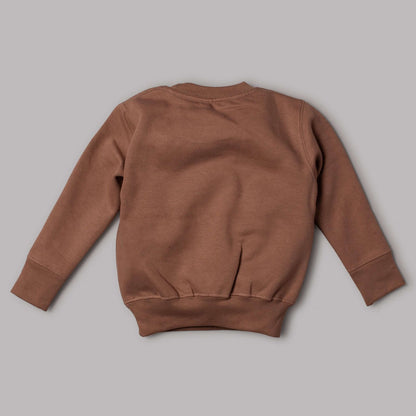 Back view of brown Happy Little Human jumper made from 60% cotton and 40% polyester, showcasing a cozy design.