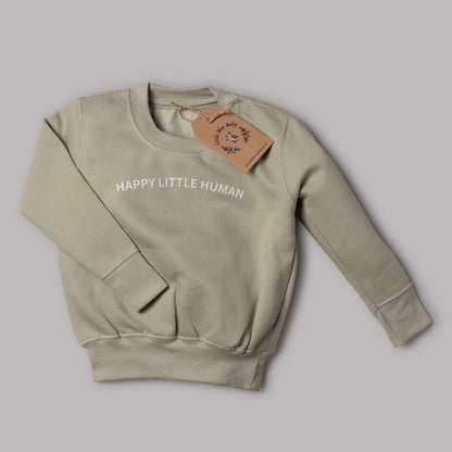 Sage green jumper with "HAPPY LITTLE HUMAN" text, made of 60% cotton and 40% polyester, perfect for kids.